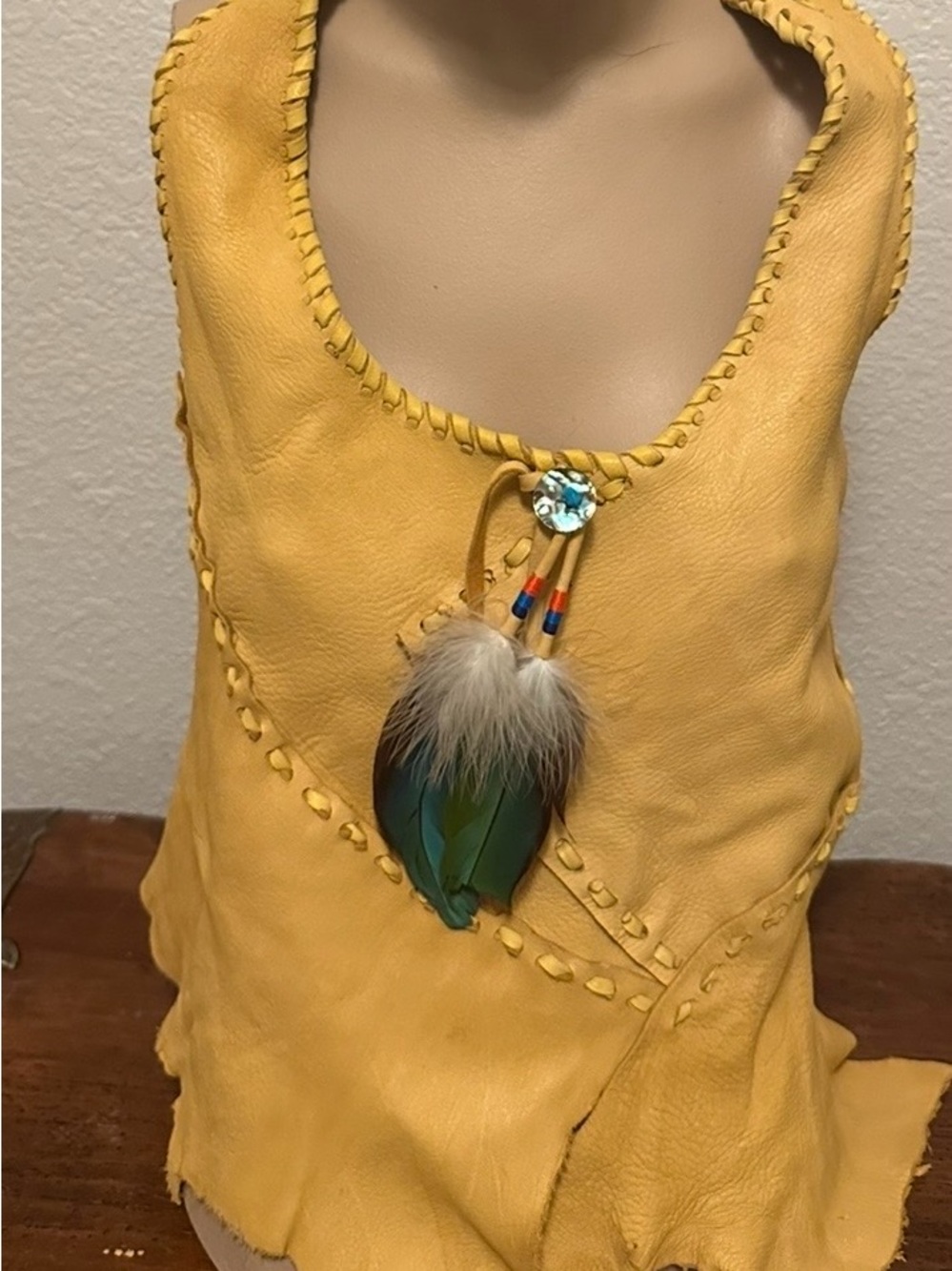 Hand Crafted Mustard Yellow Soft Elk Skin Halter Top with macaw feather accents - Picture 5 of 5